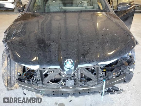 2023 BMW iX xDrive50 with VIN WB523CF08PCM77367, listed as a Copart auction lot 43043695 with 17,213 mi miles and Salvage Title. Bid and sale history available at carsss.com. Image 12.