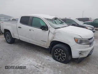 2018 Chevrolet Colorado 4WD Work Truck z VIN 1GCGTBEN3J1271023, wystawiony jako IAAI lot #41013812 z przebiegiem 124 032 mil mil oraz . Historia ofert i sprzedaży dostępna na DreamBid. Obrazek 1.