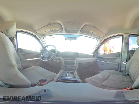 2005 Jeep Grand Cherokee Laredo with VIN 1J4GR48K05C625144, listed as a Copart auction lot 57477275 with 167,654 mi miles and Salvage title. Bid and sale history available at DreamBid. Image 15.