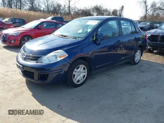 2011 Nissan Versa 1.8 S with VIN 3N1BC1APXBL395928, listed as a IAAI auction lot 41544503 with 229,242 mi miles. Bid and sale history available at carsss.com. Image 2.