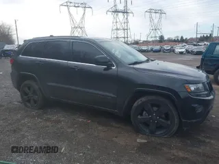 2015 Jeep Grand Cherokee Laredo with VIN 1C4RJFAG5FC859661, listed as a IAAI auction lot 41486919 with 101,777 mi miles. Bid and sale history available at carsss.com. Image 1.