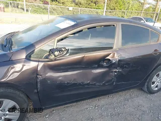 2018 Kia Forte LX with VIN 3KPFL4A70JE182702, listed as a IAAI auction lot 42043345 with 105,451 mi miles and . Bid and sale history available at carsss.com. Image 6.