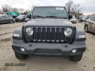 2023 Jeep Wrangler Sport S with VIN 1C4HJXDN1PW596242, listed as a Copart auction lot 82020314 with 30,061 mi miles and Salvage title. Bid and sale history available at DreamBid. Image 5.