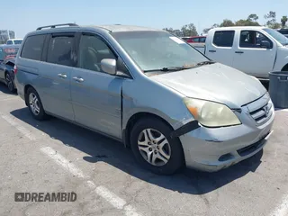 2005 Honda Odyssey EX z VIN 5FNRL38415B086709, wystawiony jako IAAI lot #42308829 z przebiegiem 187 351 mil mil oraz . Historia ofert i sprzedaży dostępna na DreamBid. Obrazek 1.