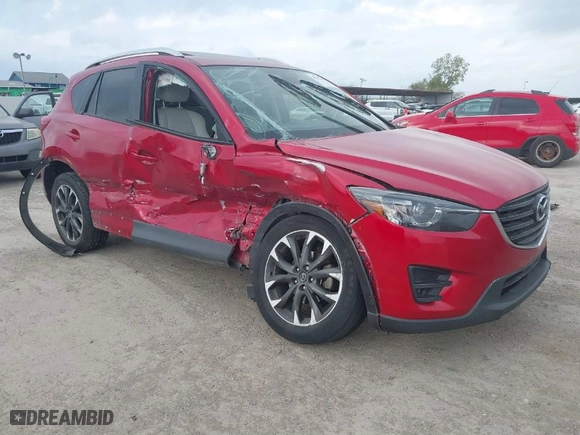 2016 Mazda CX-5 Grand Touring with VIN JM3KE4DYXG0641174, listed as a IAAI auction lot 41182655 with NaN miles. Bid and sale history available at carsss.com. Image 1.