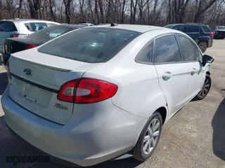 2012 Ford Fiesta SE with VIN 3FADP4BJ6CM173247, listed as a IAAI auction lot 41675349 with 116,934 mi miles. Bid and sale history available at carsss.com. Image 3.