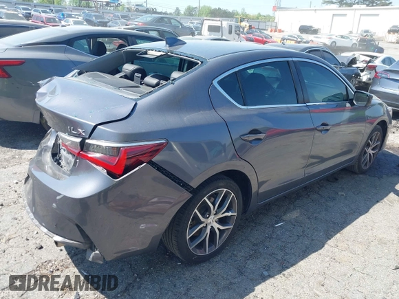 2019 Acura ILX Premium with VIN 19UDE2F7XKA012125, listed as a IAAI auction lot 42006315 with 57,089 mi miles and . Bid and sale history available at DreamBid. Image 4.