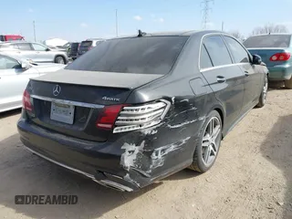 2015 Mercedes-Benz E-Class E 350 Luxury with VIN WDDHF8JB0FB112042, listed as a IAAI auction lot 41771389 with 135,191 mi miles. Bid and sale history available at carsss.com. Image 4.