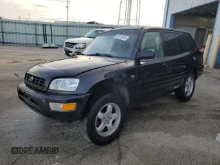1999 Toyota RAV4 with VIN JT3GP10V9X7042801, listed as a Copart auction lot 82712874 with 256,151 mi miles and Salvage Title. Bid and sale history available at DreamBid. Image 1.