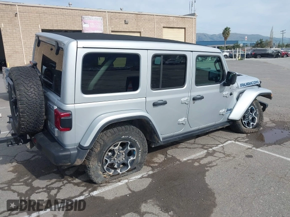 2023 Jeep Wrangler Rubicon with VIN 1C4JJXR69PW581474, listed as a IAAI auction lot 41697016 with 25,775 mi miles and . Bid and sale history available at DreamBid. Image 4.