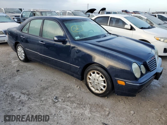 2000 Mercedes-Benz E-Class with VIN WDBJF65J7YB047628, listed as a Copart auction lot 75278704 with 0 mi miles and Salvage Title. Bid and sale history available at carsss.com. Image 4.
