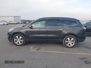 2015 Chevrolet Traverse LTZ with VIN 1GNKVJKDXFJ206159, listed as a IAAI auction lot 41762515 with 143,062 mi miles and . Bid and sale history available at DreamBid. Image 14.