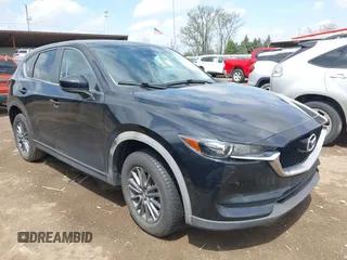 2017 Mazda CX-5 Touring z VIN JM3KFBCL0H0162965, wystawiony jako IAAI lot #42052391 z przebiegiem Nie podano mil oraz . Historia ofert i sprzedaży dostępna na DreamBid. Obrazek 1.