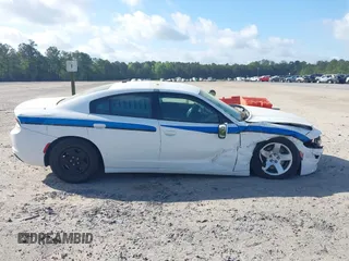 2019 Dodge Charger Police with VIN 2C3CDXAT3KH599711, listed as a IAAI auction lot 41906214 with 80,462 mi miles and . Bid and sale history available at DreamBid. Image 13.