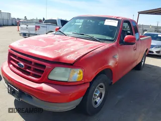 2003 Ford F-150 XL with VIN 1FTRX17293NB92395, listed as a IAAI auction lot 41885536 with 1 mi miles. Bid and sale history available at carsss.com. Image 2.
