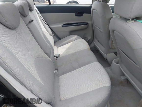 2006 Hyundai Accent GLS z VIN KMHCN46C76U038040, wystawiony jako IAAI lot #42220455 z przebiegiem 140 413 mil mil oraz . Historia ofert i sprzedaży dostępna na DreamBid. Obrazek 8.
