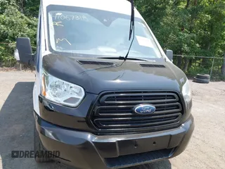 2017 Ford Transit with VIN 1FTYR3XM1HKA71226, listed as a IAAI auction lot 42424063 with 469,652 mi miles and . Bid and sale history available at DreamBid. Image 12.