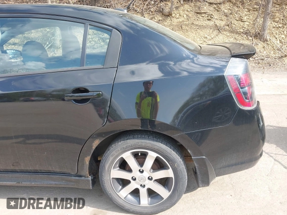 2012 Nissan Sentra SR with VIN 3N1AB6AP9CL750066, listed as a IAAI auction lot 42133339 with 122,581 mi miles and . Bid and sale history available at DreamBid. Image 12.