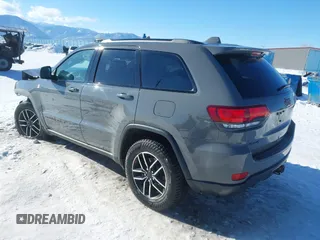 2021 Jeep Grand Cherokee Trailhawk with VIN 1C4RJFLG2MC854007, listed as a IAAI auction lot 41512394 with 50,674 mi miles. Bid and sale history available at carsss.com. Image 3.