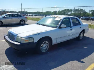 2006 Mercury Grand Marquis LS Premium z VIN 2MEFM75V46X614439, wystawiony jako IAAI lot #42319947 z przebiegiem 125 715 mil mil oraz . Historia ofert i sprzedaży dostępna na DreamBid. Obrazek 2.