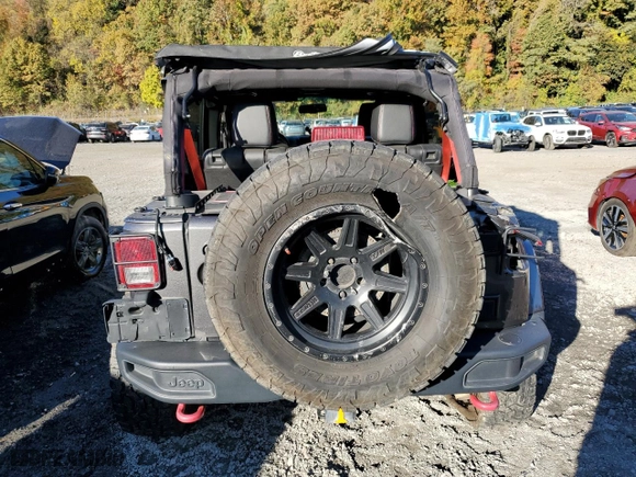 2018 Jeep Wrangler JK Unlimited Rubicon Recon with VIN 1C4HJWFG5JL803636, listed as a Copart auction lot 76370924 with 77,943 mi miles and Salvage Title. Bid and sale history available at carsss.com. Image 6.