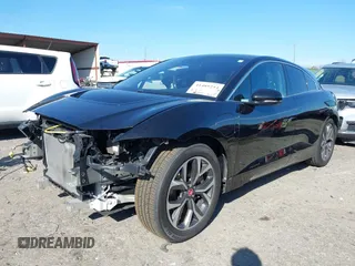 2020 Jaguar I-Pace SE with VIN SADHC2S12L1F87240, listed as a IAAI auction lot 41489254 with 58,359 mi miles and . Bid and sale history available at DreamBid. Image 2.
