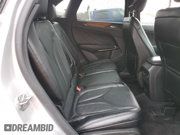 2015 Lincoln MKC z VIN 5LMCJ2A94FUJ10689, wystawiony jako Copart lot #49952045 z przebiegiem 128 040 mil mil oraz Szkoda całkowita • Salvage title. Historia ofert i sprzedaży dostępna na DreamBid. Obrazek 10.