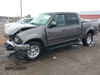 2003 Ford F-150 XLT with VIN 1FTRW086X3KA54557, listed as a IAAI auction lot 41888037 with 217,512 mi miles. Bid and sale history available at carsss.com. Image 2.