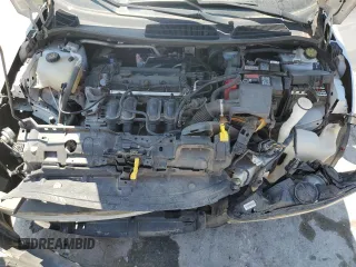 2014 Ford Fiesta S z VIN 3FADP4TJ1EM177322, wystawiony jako Copart lot #55786555 z przebiegiem 67 460 mil mil oraz Szkoda całkowita • Salvage title. Historia ofert i sprzedaży dostępna na DreamBid. Obrazek 11.