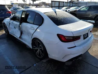 2019 BMW 3 Series 330i with VIN WBA5R1C59KAK07604, listed as a Copart auction lot 66944152 with 57,119 mi miles. Bid and sale history available at carsss.com. Image 3.