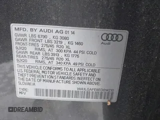 2014 Audi Q7 Premium Plus with VIN WA1LGAFE8ED014210, listed as a IAAI auction lot 42176663 with 101,557 mi miles and . Bid and sale history available at DreamBid. Image 9.