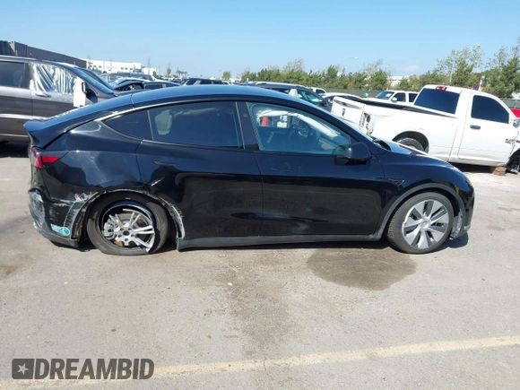 2024 Tesla Model Y Long Range z VIN 7SAYGDEE0RF078242, wystawiony jako IAAI lot #41808826 z przebiegiem 59 581 mil mil oraz . Historia ofert i sprzedaży dostępna na DreamBid. Obrazek 14.