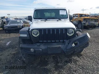2023 Jeep Wrangler Sport with VIN 1C4HJXDG4PW567027, listed as a IAAI auction lot 41633197 with 14,782 mi miles and . Bid and sale history available at DreamBid. Image 13.