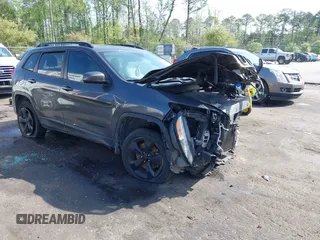2016 Jeep Cherokee Latitude with VIN 1C4PJMCS9GW103845, listed as a IAAI auction lot 41933274 with 177,472 mi miles and . Bid and sale history available at carsss.com. Image 1.