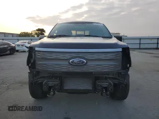 2023 Ford F-150 Lightning Pro with VIN 1FTVW1EV1PWG16263, listed as a Copart auction lot 54439535 with 12,023 mi miles and Salvage Title. Bid and sale history available at DreamBid. Image 5.