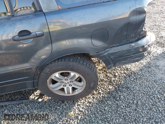2003 Honda Pilot EX with VIN 2HKYF18433H614451, listed as a IAAI auction lot 41561972 with 199,394 mi miles. Bid and sale history available at carsss.com. Image 6.
