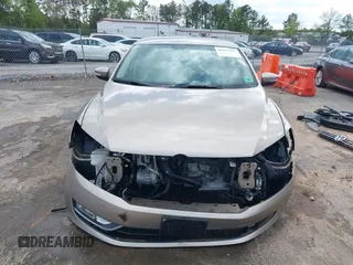 2015 Volkswagen Passat 1.8T Limited Edition with VIN 1VWAT7A32FC120769, listed as a IAAI auction lot 42013547 with 61,451 mi miles. Bid and sale history available at carsss.com. Image 12.