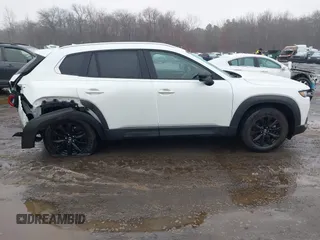 2024 Mazda CX-50 S Premium with VIN 7MMVABDM8RN162809, listed as a IAAI auction lot 41511222 with 12,516 mi miles and . Bid and sale history available at DreamBid. Image 13.