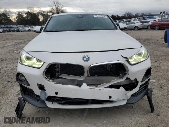 2019 BMW X2 sDrive28i with VIN WBXYJ3C58K5N39693, listed as a Copart auction lot 86760414 with 77,668 mi miles and Salvage Title. Bid and sale history available at carsss.com. Image 5.