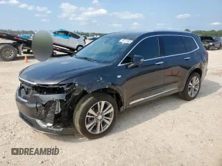 2022 Cadillac XT6 Premium Luxury z VIN 1GYKPCRS1NZ104567, wystawiony jako Copart lot #58211505 z przebiegiem 54 541 mil mil oraz Tytuł czysty. Historia ofert i sprzedaży dostępna na DreamBid. Obrazek 1.