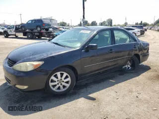 2004 Toyota Camry LE with VIN 4T1BE32K14U336714, listed as a Copart auction lot 60548705 with 154,977 mi miles and Salvage title. Bid and sale history available at DreamBid. Image 1.