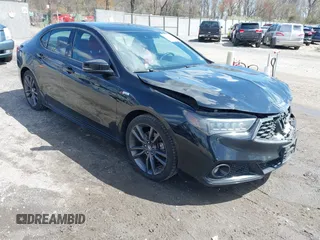 2019 Acura TLX w/A-Spec Pkg z VIN 19UUB2F66KA004345, wystawiony jako IAAI lot #41969401 z przebiegiem 71 644 mil mil oraz . Historia ofert i sprzedaży dostępna na DreamBid. Obrazek 1.