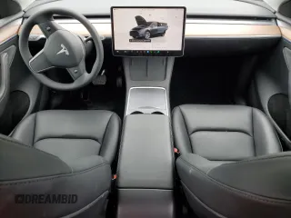 2024 Tesla Model Y Long Range with VIN 7SAYGDEE9RF069801, listed as a Copart auction lot 60857145 with 18,808 mi miles and Salvage title. Bid and sale history available at DreamBid. Image 8.
