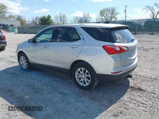 2018 Chevrolet Equinox LT z VIN 2GNAXJEV6J6186718, wystawiony jako IAAI lot #41867409 z przebiegiem 109 244 mil mil oraz . Historia ofert i sprzedaży dostępna na DreamBid. Obrazek 3.