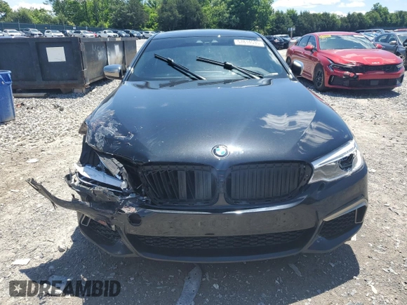 2019 BMW 5 Series M550i xDrive with VIN WBAJB9C53KB289356, listed as a Copart auction lot 57814535 with 60,454 mi miles and Clean title. Bid and sale history available at DreamBid. Image 5.