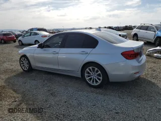2017 BMW 3 Series 320i with VIN WBA8E1G50HNU14368, listed as a Copart auction lot 48378995 with 105,295 mi miles and Salvage Title. Bid and sale history available at carsss.com. Image 2.