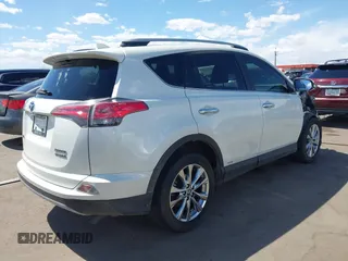 2017 Toyota RAV4 Hybrid Limited with VIN JTMDJREV4HD110724, listed as a IAAI auction lot 42141585 with 80,671 mi miles. Bid and sale history available at carsss.com. Image 4.