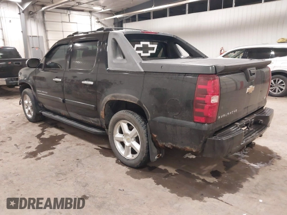 2007 Chevrolet Avalanche LTZ with VIN 3GNFK12327G236731, listed as a IAAI auction lot 41707271 with 243,088 mi miles. Bid and sale history available at carsss.com. Image 3.