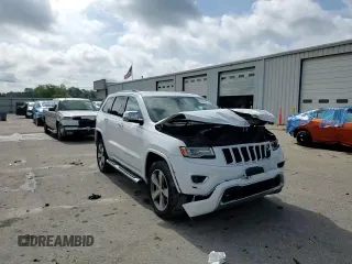 2015 Jeep Grand Cherokee Overland with VIN 1C4RJFCGXFC891616, listed as a Copart auction lot 61386065 with 90,011 mi miles and Salvage title. Bid and sale history available at DreamBid. Image 14.