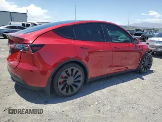 2022 Tesla Model Y Performance z VIN 7SAYGDEF9NF510183, wystawiony jako Copart lot #61263405 z przebiegiem 19 411 mil mil oraz Szkoda całkowita • Salvage title. Historia ofert i sprzedaży dostępna na DreamBid. Obrazek 3.